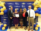 Frances Squire being presented with award. Left to right are Jody Ruble, Dean of Students; Frances Squire; Sylvia Dorsey Robinson, Vice President Student Services; President Kristin Clark; James Preston, Vice President of Educational Services.